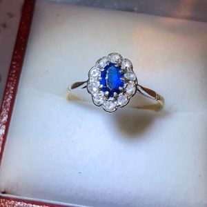 gold and platinum diamond and sapphire ring